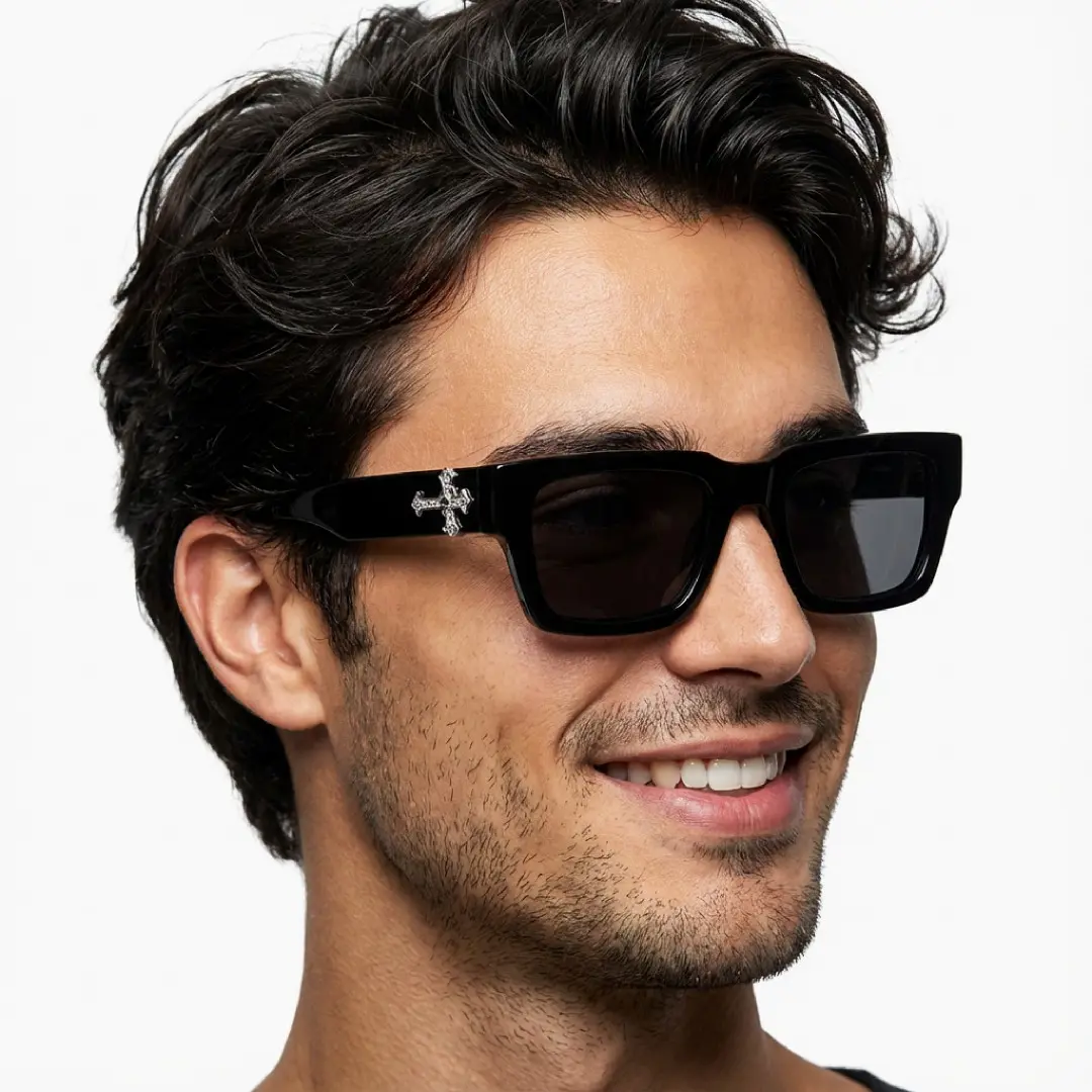 Three-quarter view of male wearing black rectangle sunglasses, smiling, EP0082511
