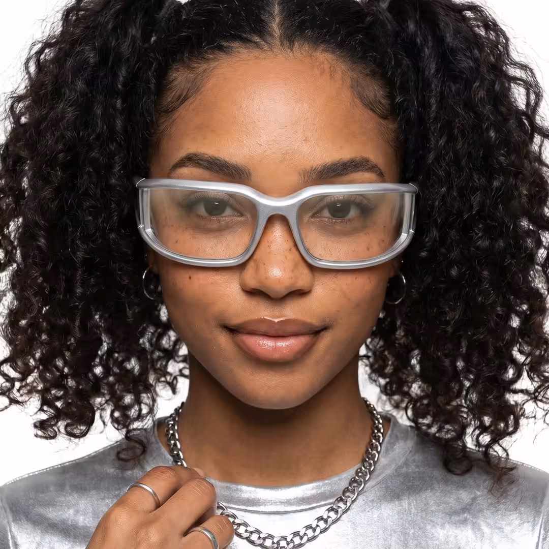 Front view of female wearing y2k silver rectangle sunglasses, natural smile, EP0092605