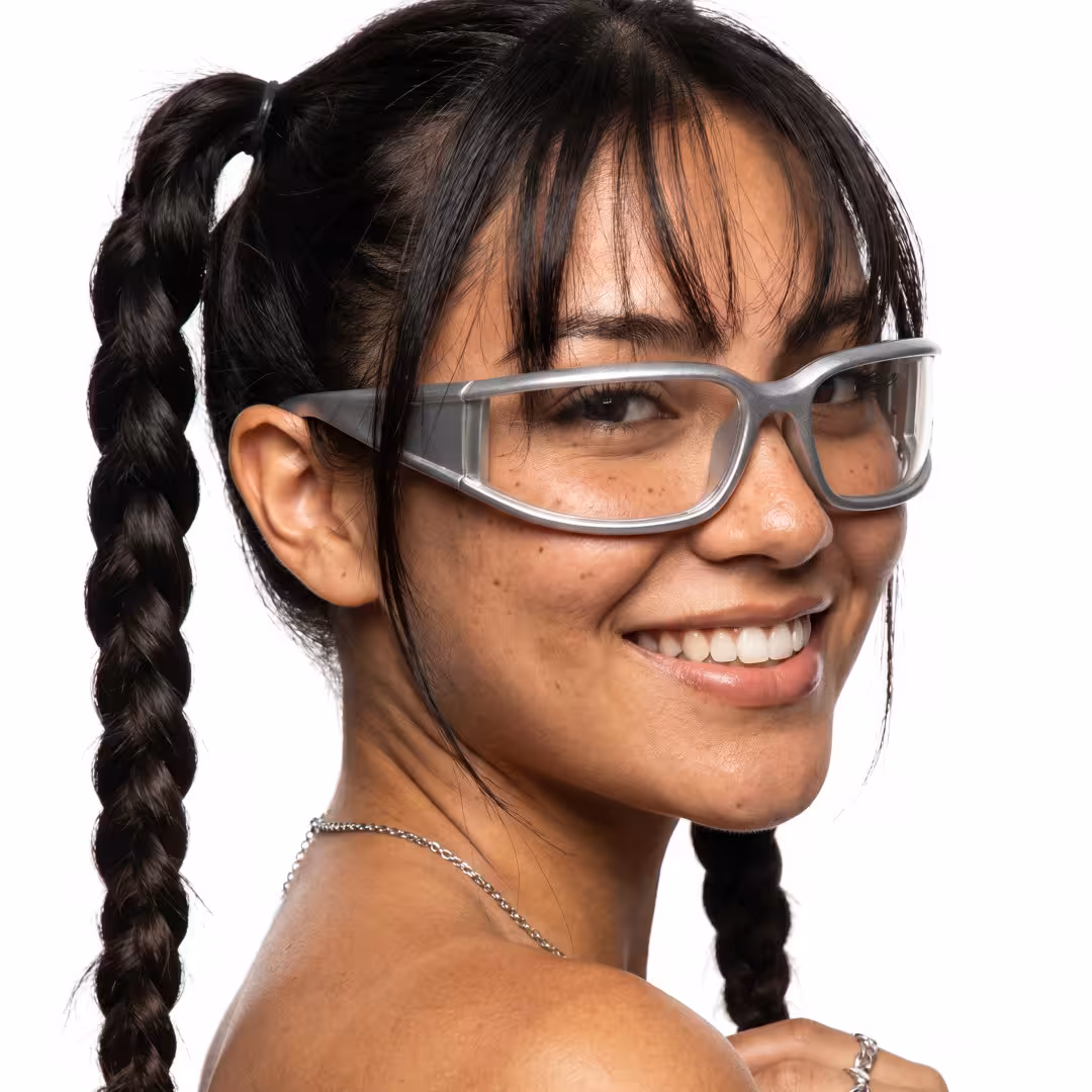 Female wearing y2k silver rectangle pc sunglasses, smiling. SPU: EP0092605
