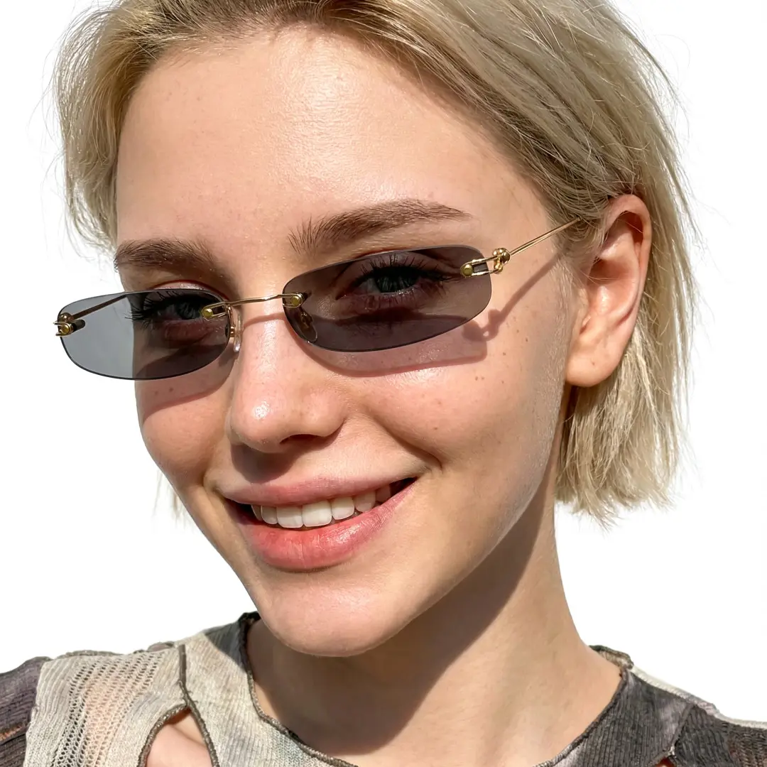 Face close-up view of female wearing grey rectangle sunglasses, wide smile, EP0112410