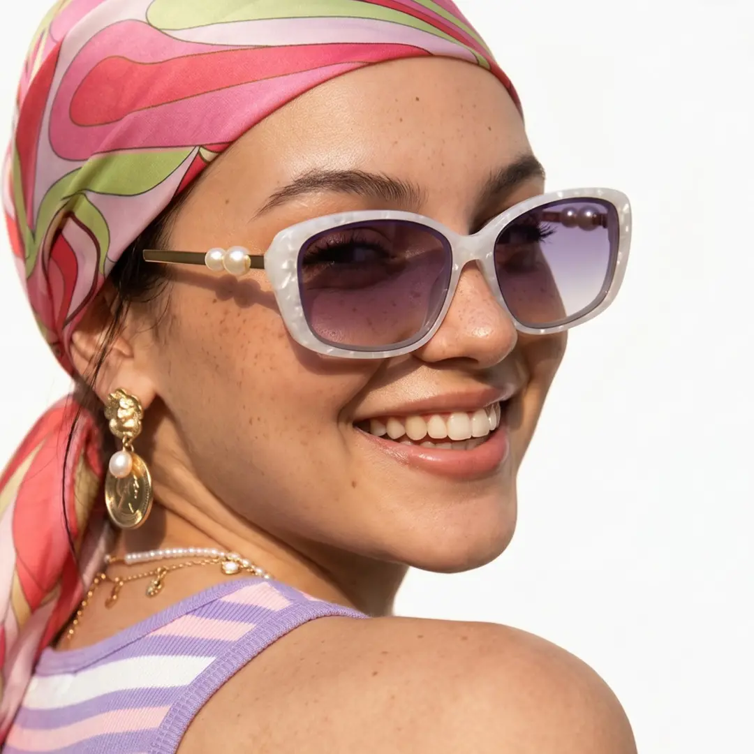 Over-the-shoulder view of female wearing white rectangle sunglasses, smiling, EP0232603