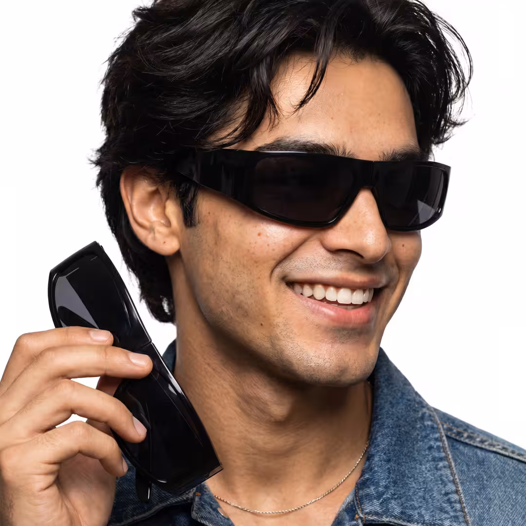Male wearing y2k black rectangle tr90 sunglasses, smiling. SPU: ER0132605