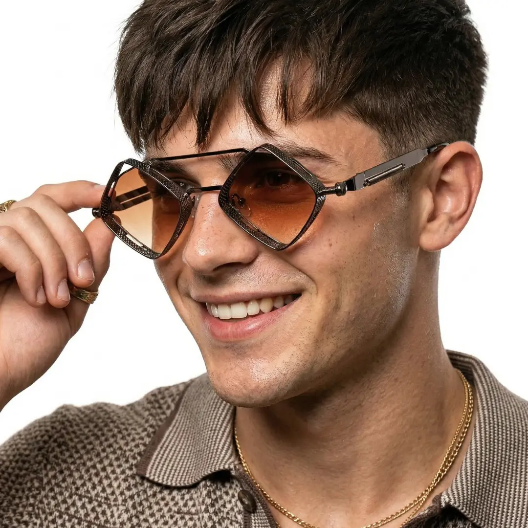 Profile view of male wearing steampunk brown geometric sunglasses, touching frame, smiling, GM0152604