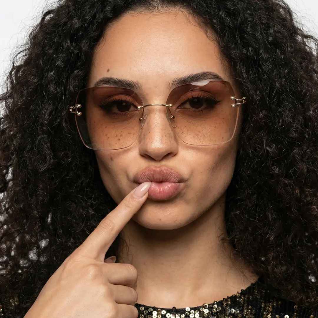 Front view of female wearing brown geometric sunglasses, Pouting, relaxed expression, GX0082505
