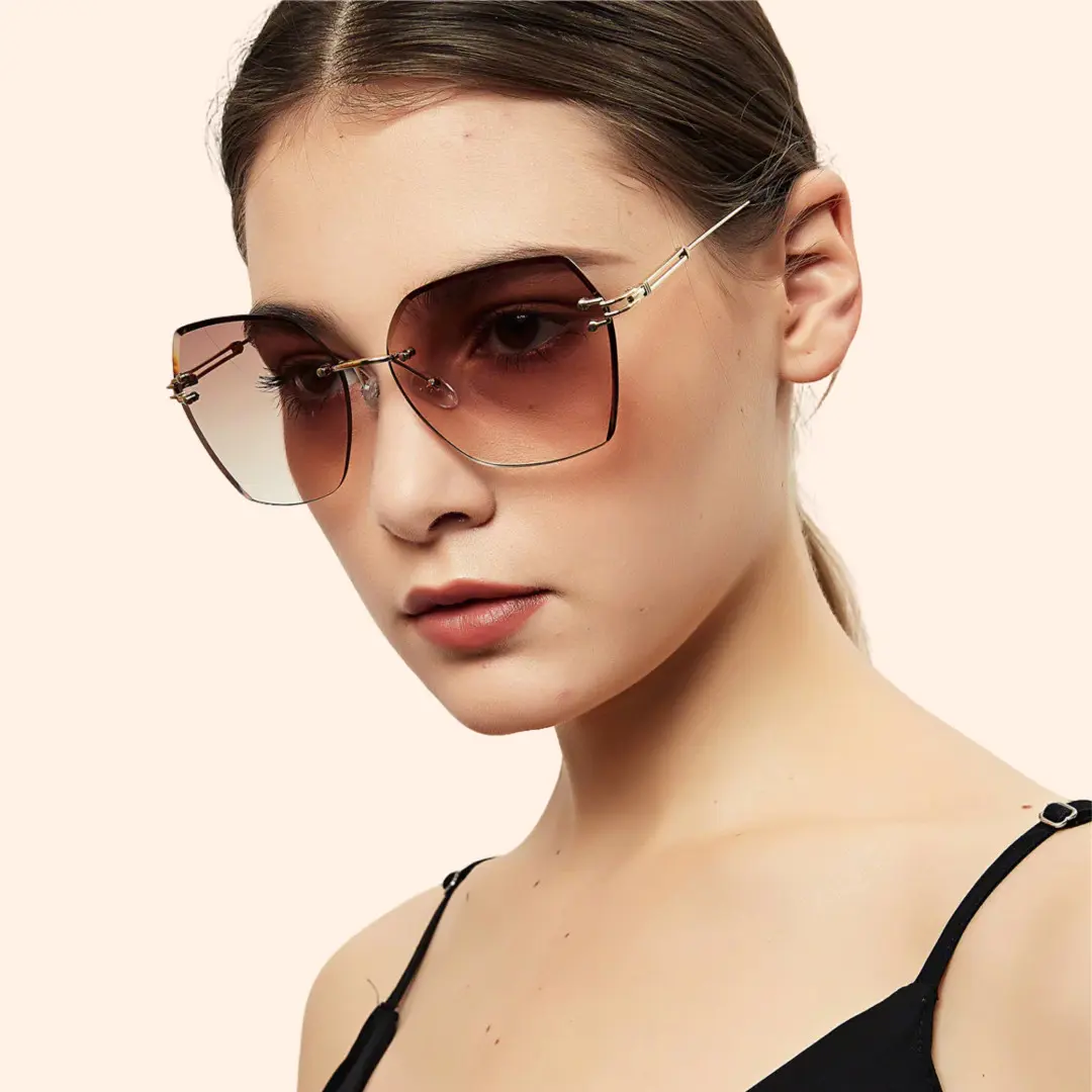 Three-quarter view of female wearing brown geometric sunglasses, natural expression, GX0082505