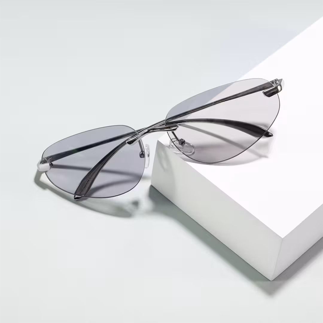 Scene view of Cuth y2k oval metal sunglasses OM0112605 in silver