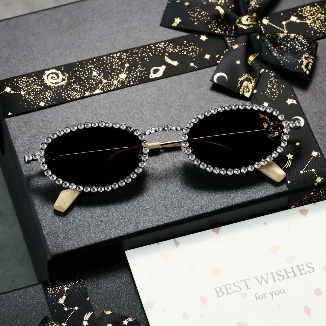 Scene view of Earlene oval metal sunglasses OM0132409 in grey