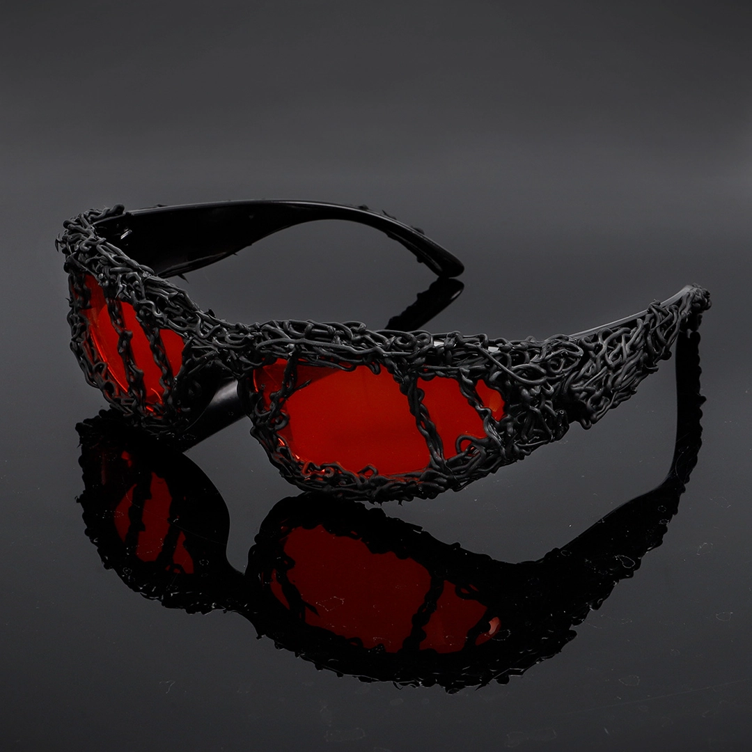 Scene view of Molten oval pc sunglasses OP0102511 in red