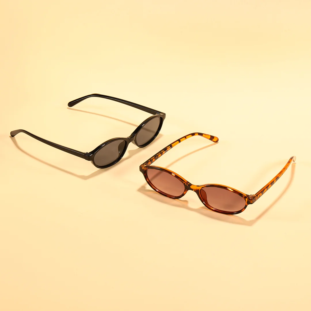 Scene view of Calisia y2k oval pc sunglasses OP0272603 in black