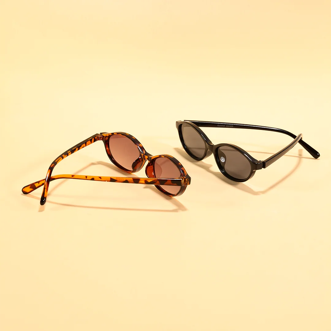 Scene view of Calisia oval pc sunglasses OP0272603 in tortoise