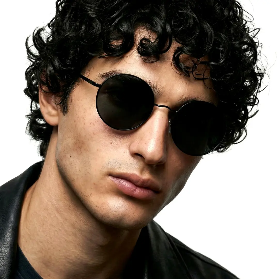 Profile view of male wearing black round sunglasses, natural expression, RM0012207