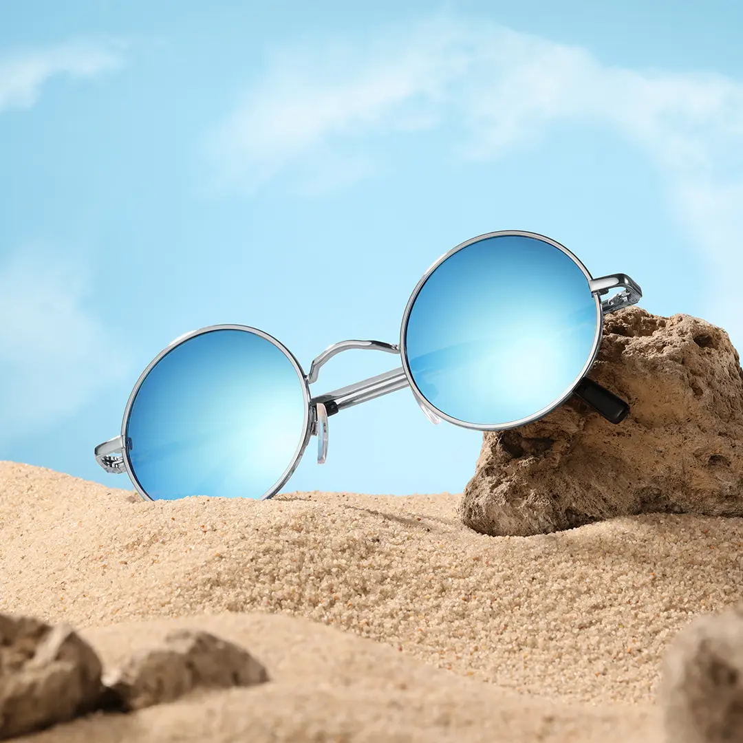 Scene view of Kaleb round metal sunglasses RM0012207 in silver blue
