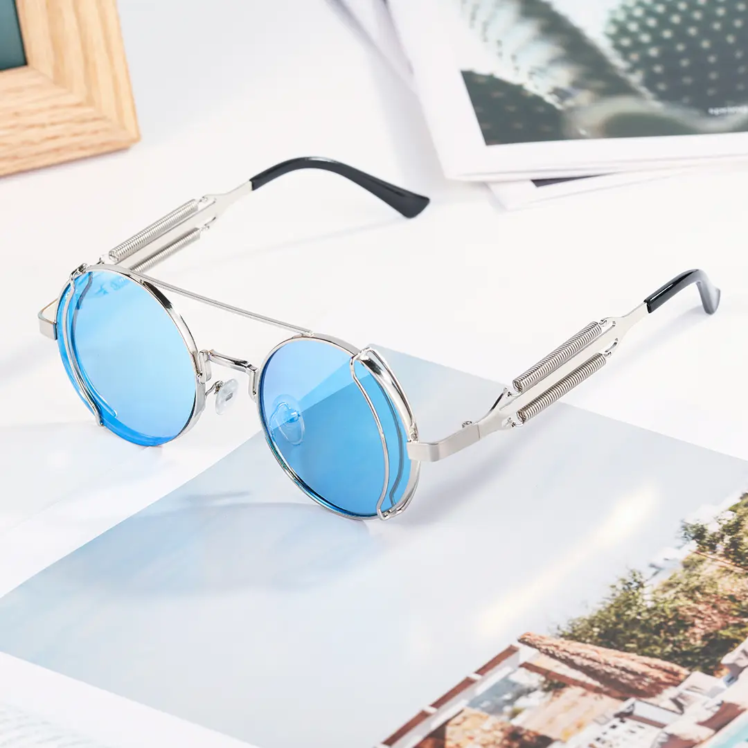 Scene close-up view of Binfing round metal sunglasses RM0102303 in blue