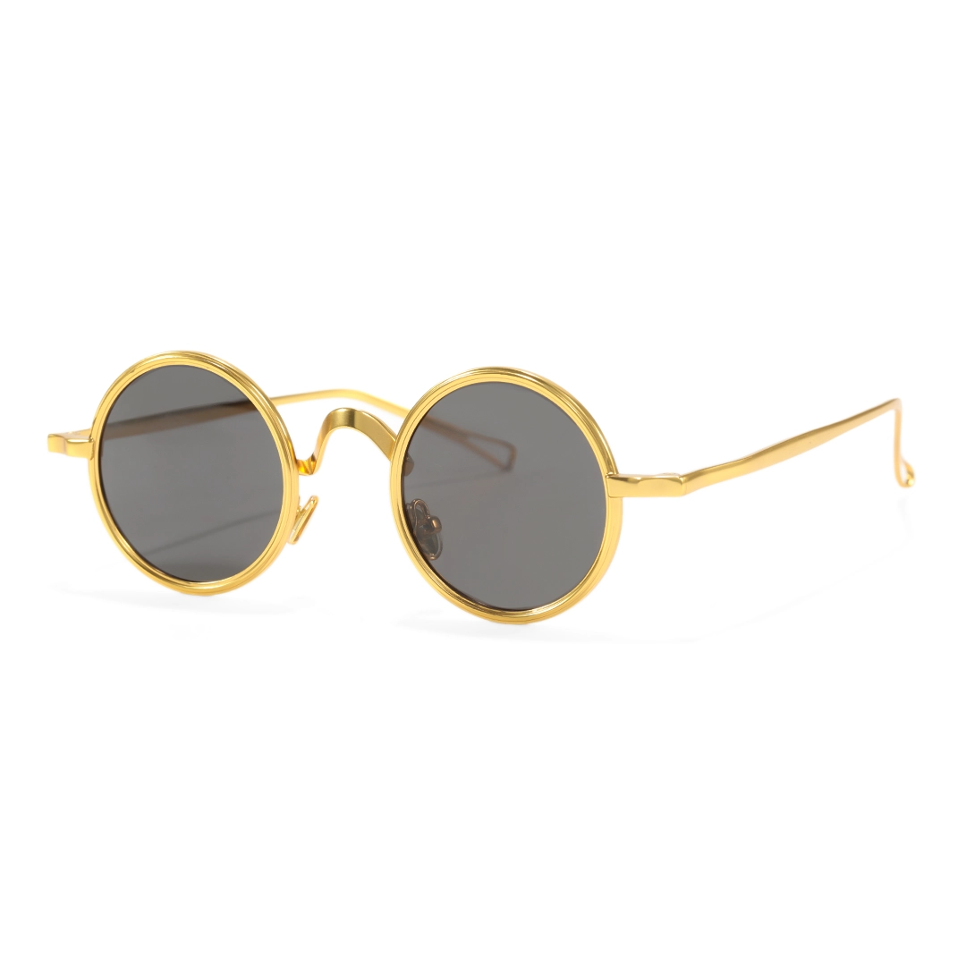 Angle view of Ewan round metal sunglasses RM0162506 in gold