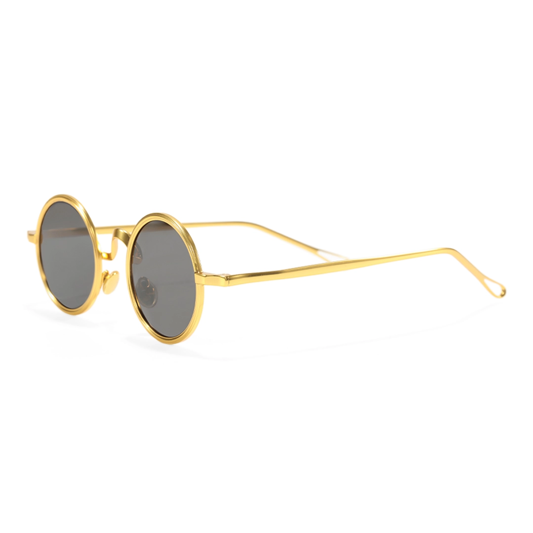 Side view of Ewan round metal sunglasses RM0162506 in gold