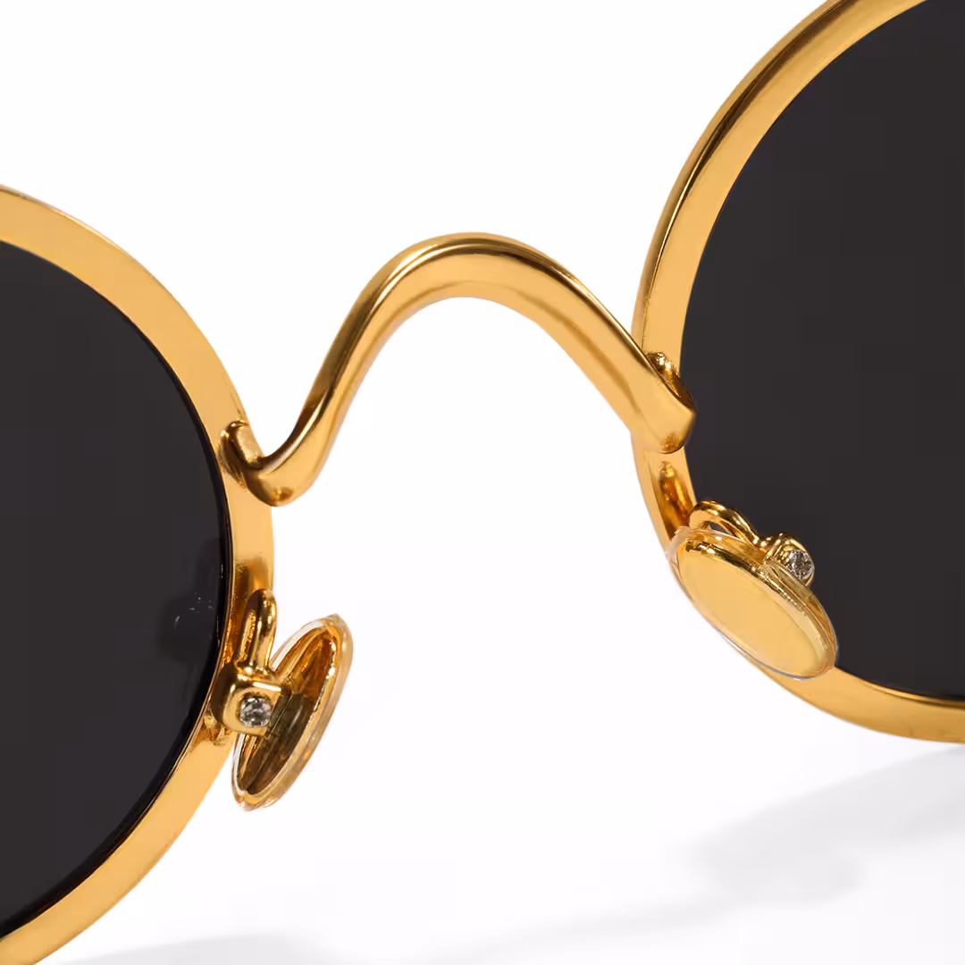 Adjustable nose pad detail of Ewan john lennon round metal sunglasses RM0162506 in gold