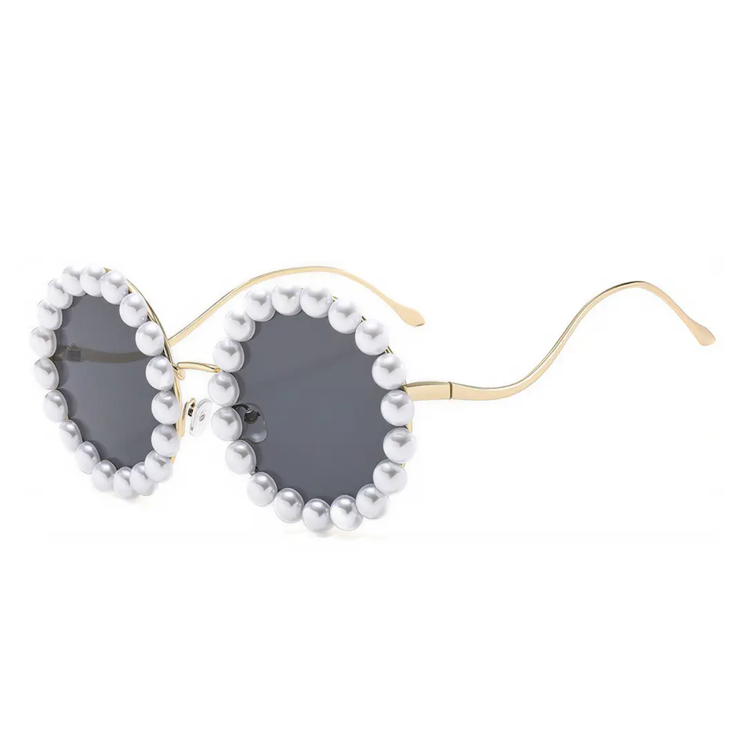 Angle view of Kiara vintage round metal sunglasses in gold. SPU: RM0202507