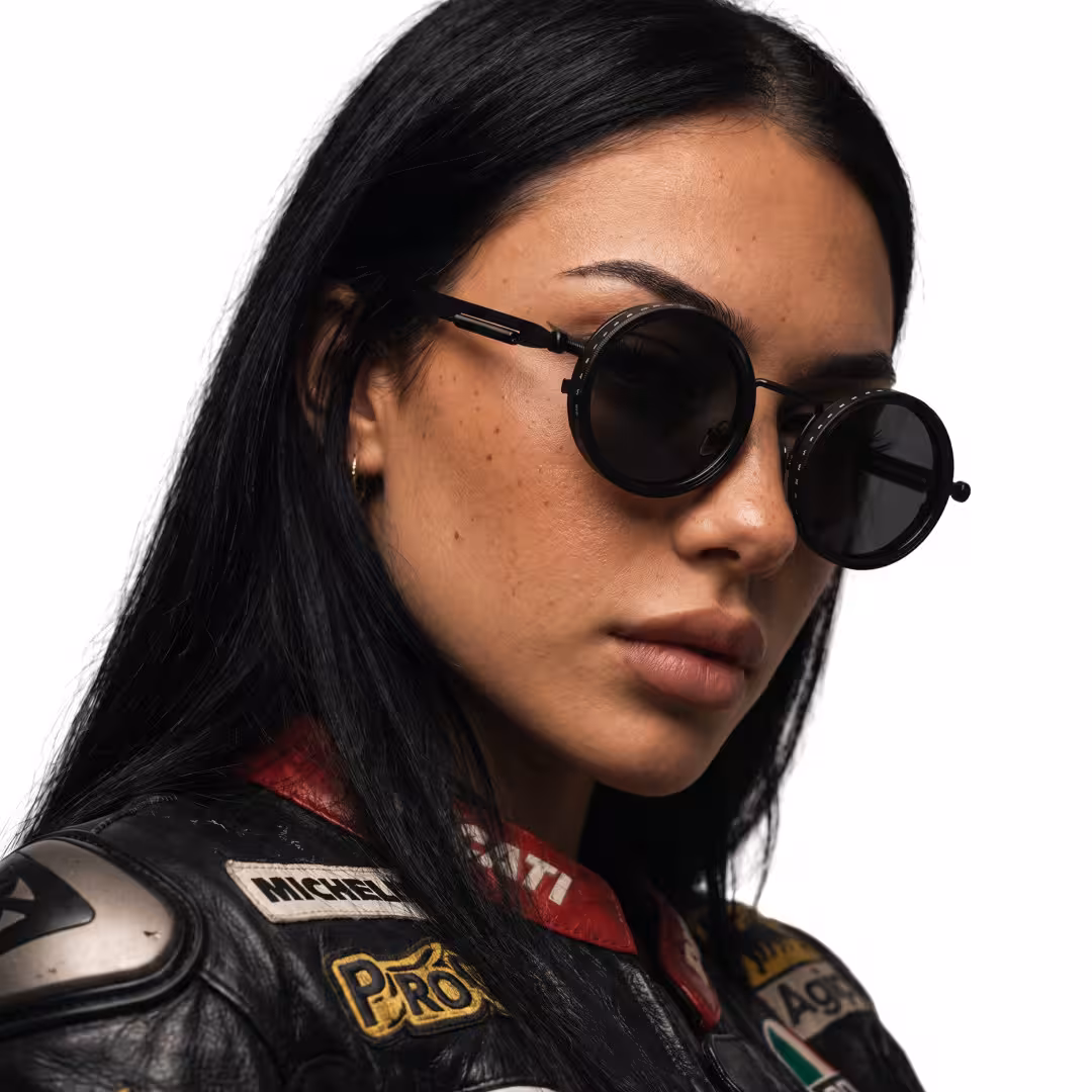 Female wearing steampunk black round metal sunglasses, confident expression. SPU: RM0312605