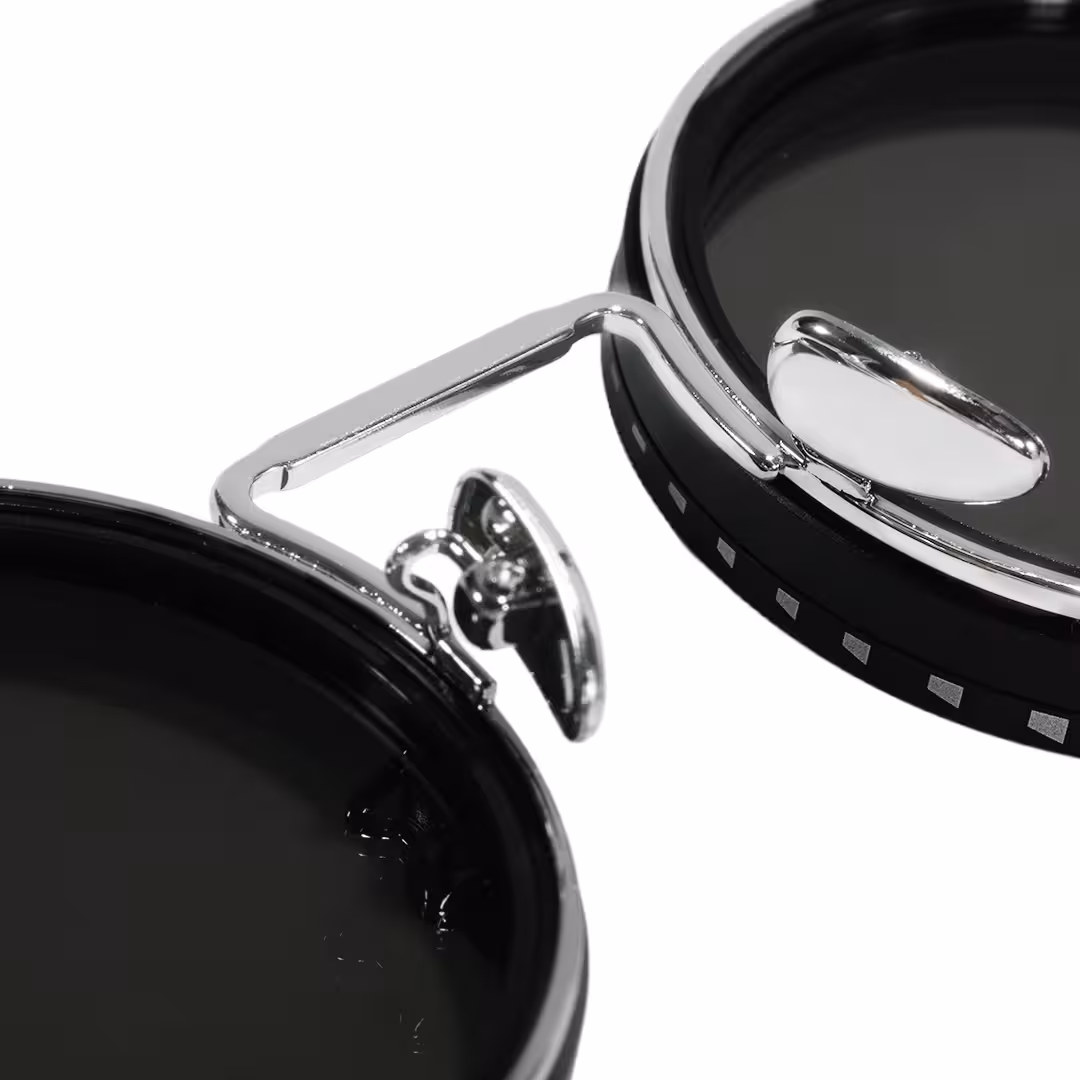 Adjustable nose pad detail of Orinr round metal sunglasses in silver. SPU: RM0312605