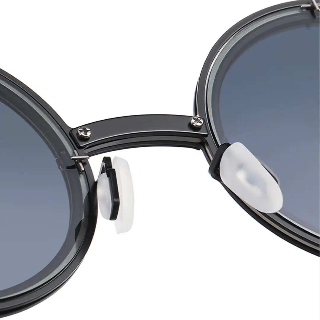 Integrated nose pad detail of Myron steampunk round metal sunglasses RM0322507 in black