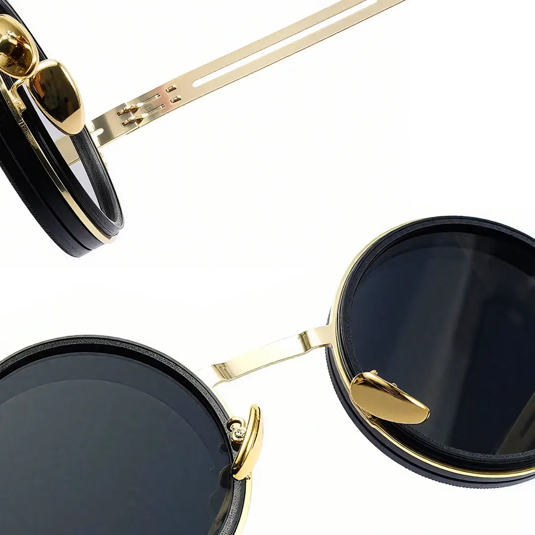 Adjustable nose pad detail of Caelon steampunk round metal sunglasses RM0352507 in gold
