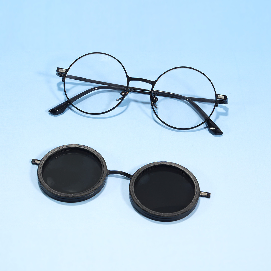 Scene view of Aeris steampunk round metal magnetic clip-on sunglasses set with interchangeable clip-on lenses RM0382507 in black