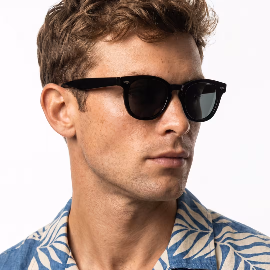 Male wearing black round tr90 sunglasses, natural expression. SPU: RR0122604