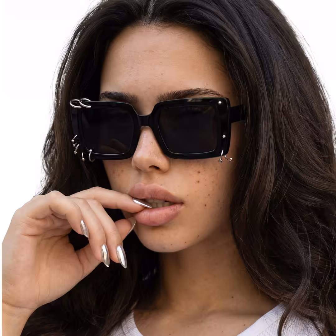 Three-quarter view of female wearing black square sunglasses, neutral expression, SR0052509