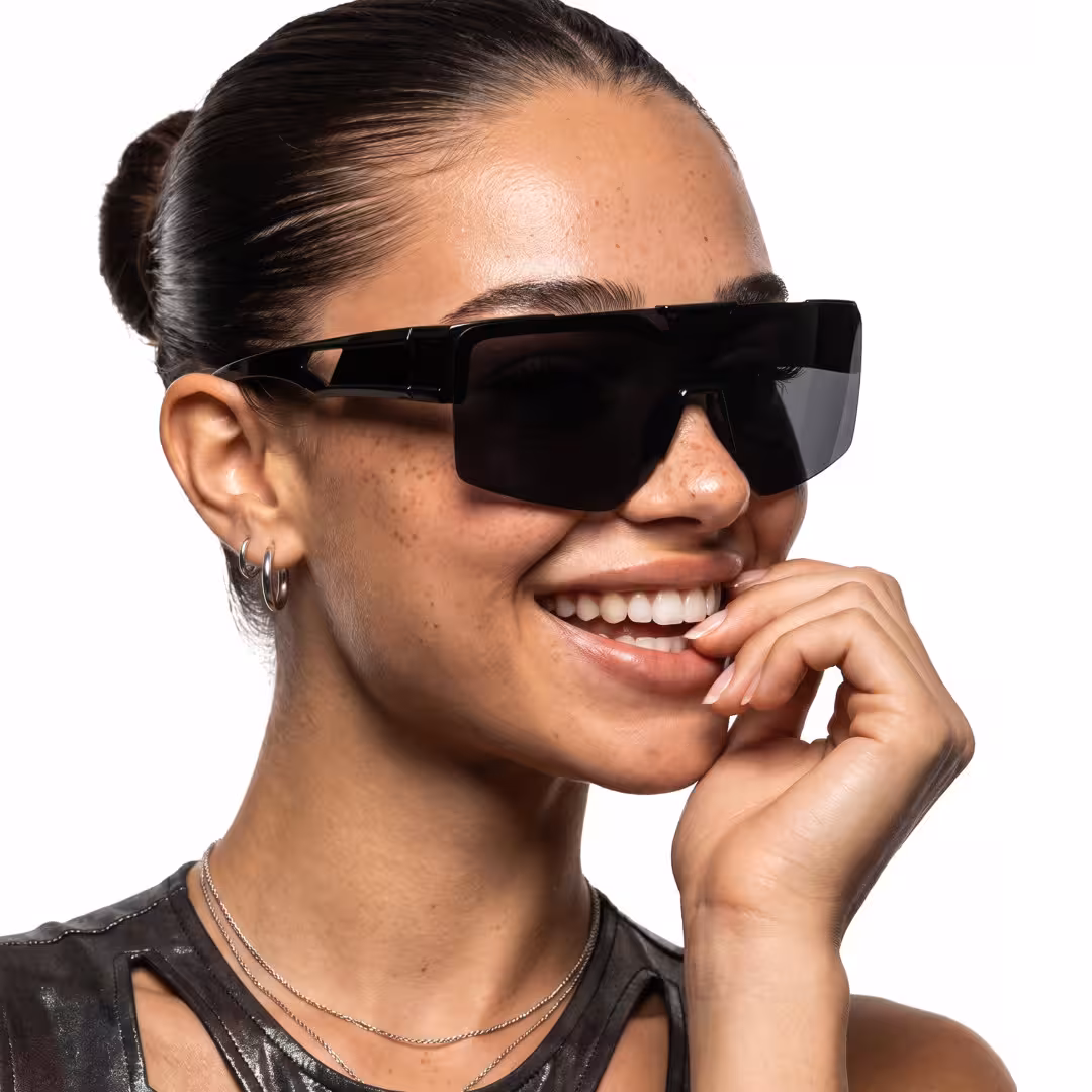 Female wearing black square tr90 flip-up sunglasses, looking relaxed while looking away. SPU: SR0062605