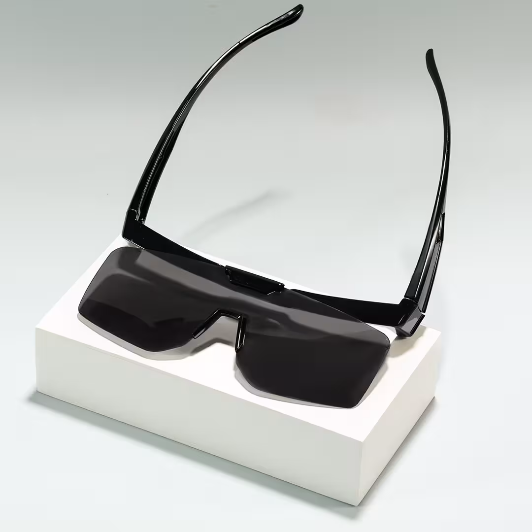 Scene close-up view of Cyra square tr90 flip-up sunglasses SR0062605 in black