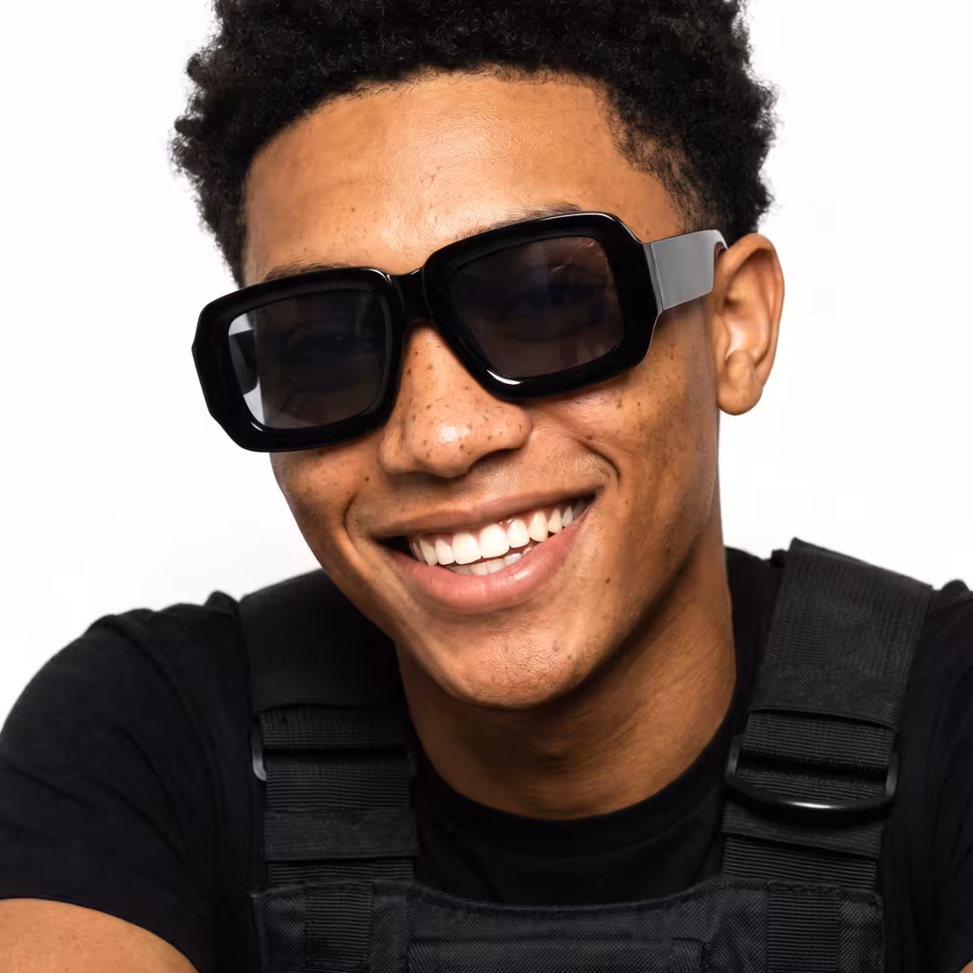 Front view of male wearing fashion black square sunglasses, smiling, SR0092303