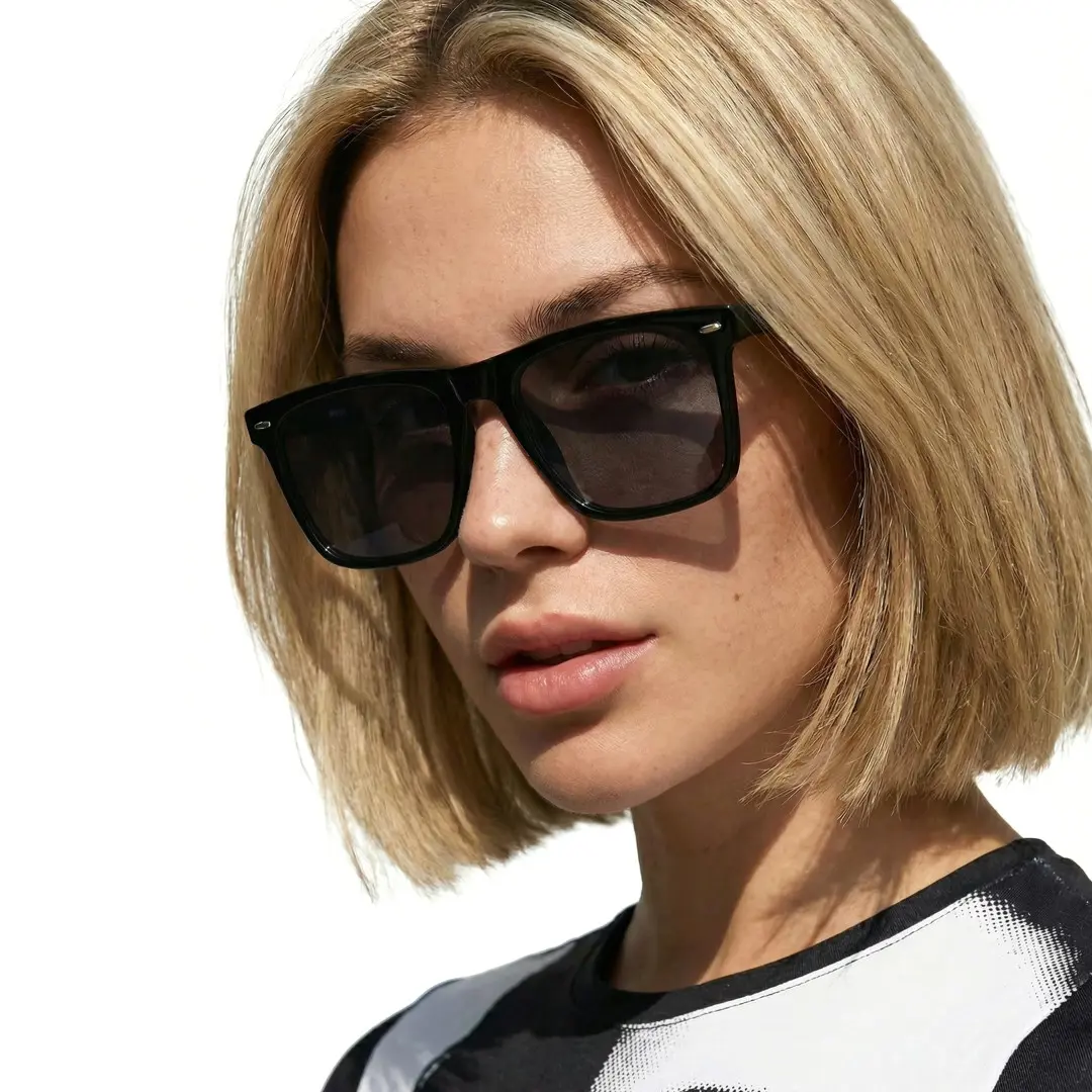 Over-the-shoulder view of female wearing black square sunglasses, neutral expression, SR0112506