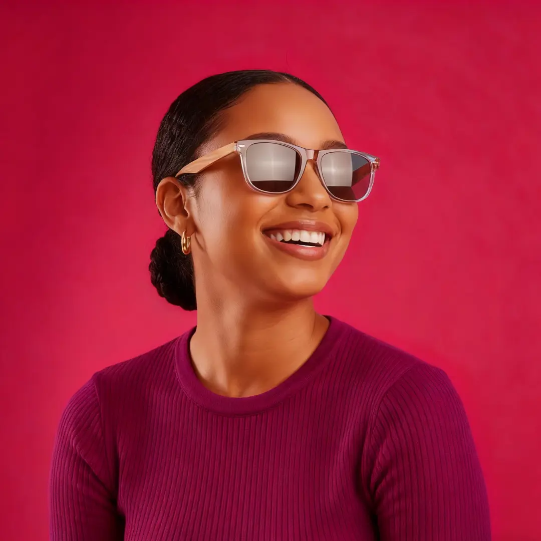 Looking away view of female wearing grey square sunglasses, smiling, SR0182303