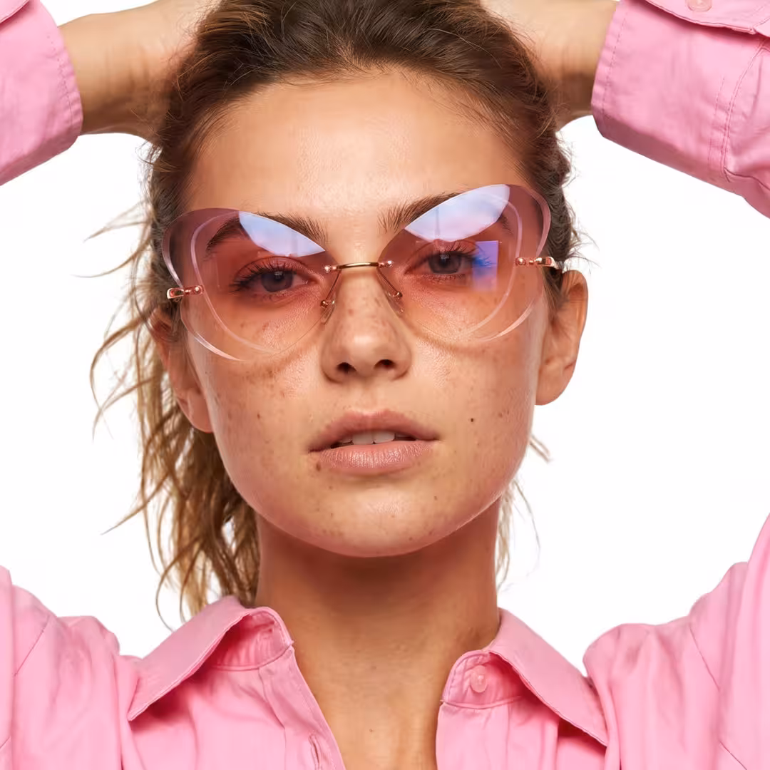 Female wearing pink unique metal sunglasses, natural expression while hand resting on forehead. SPU: UM0102604