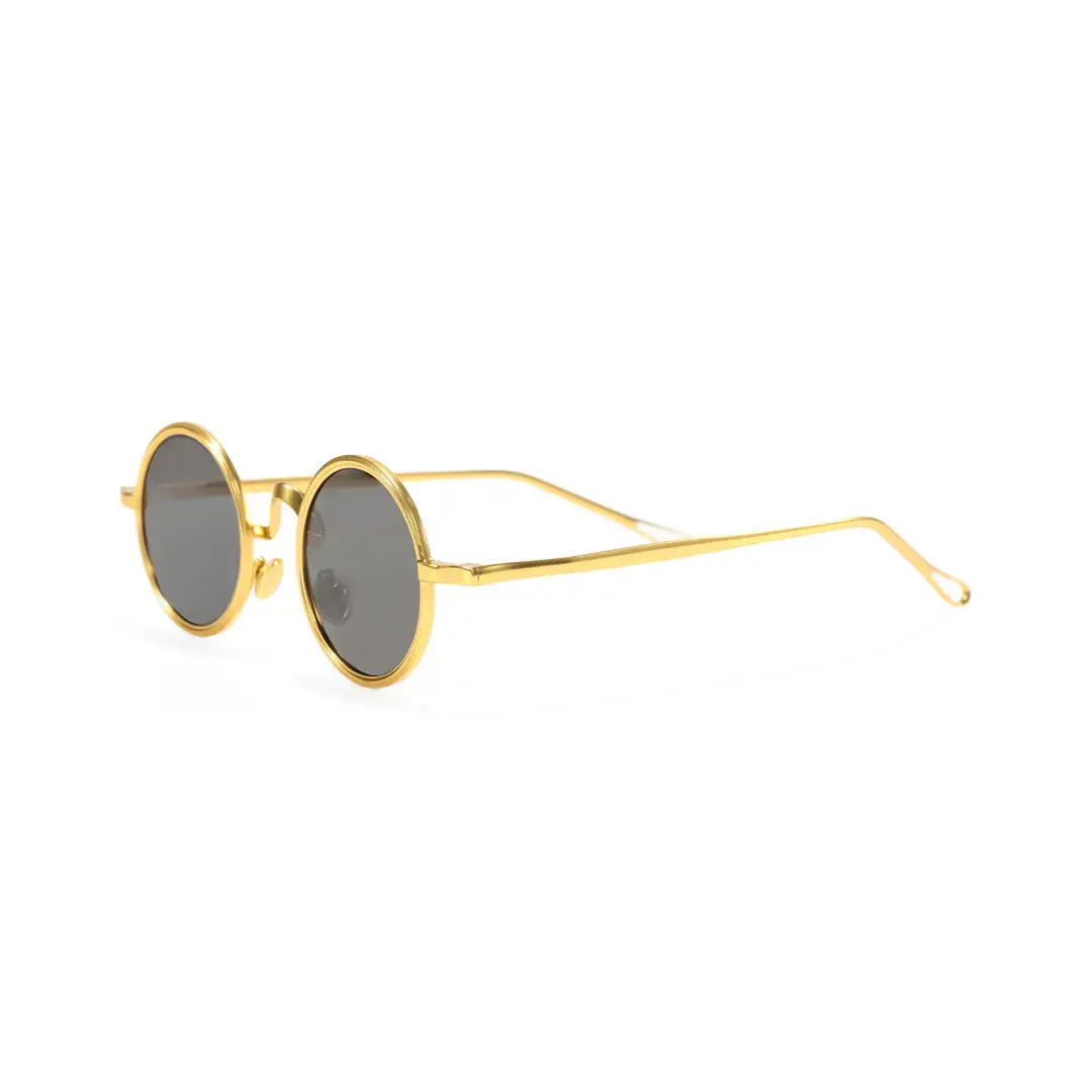 Side view of Ewan round metal sunglasses RM0162506 in gold