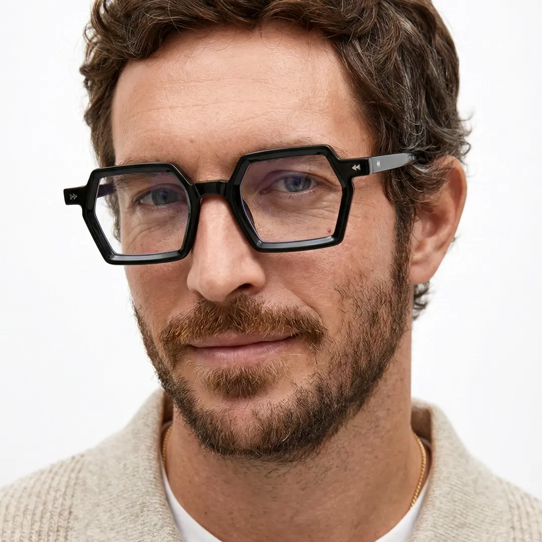 Front view of male wearing black geometric eyeglasses, natural smile, GP0132308