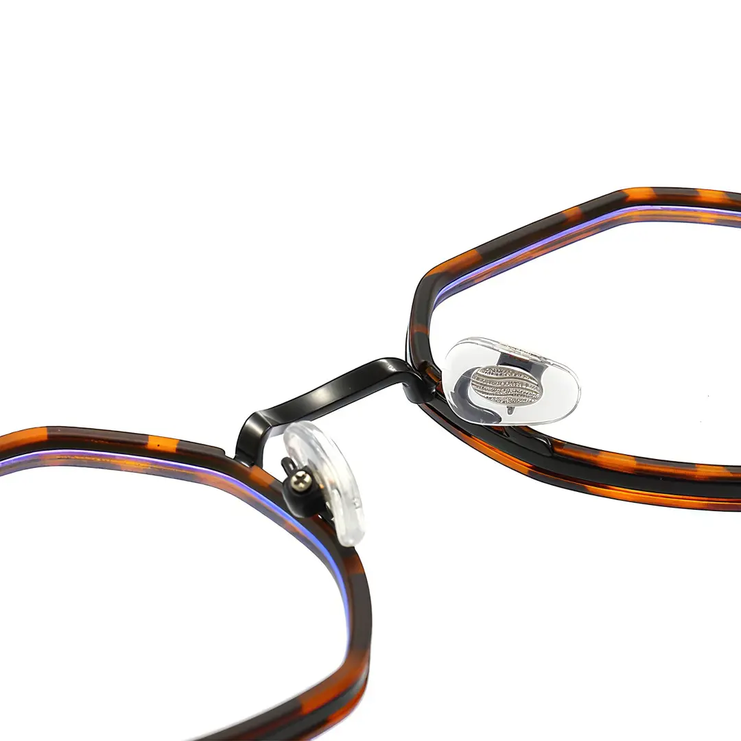 Adjustable nose pad detail of Koi geometric tr90 eyeglasses GR0102308 in tortoise