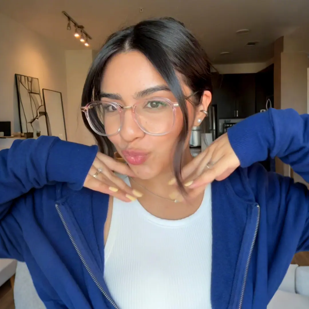 Looking straight ahead view of female wearing pink square eyeglasses, various expressions, SR0012502