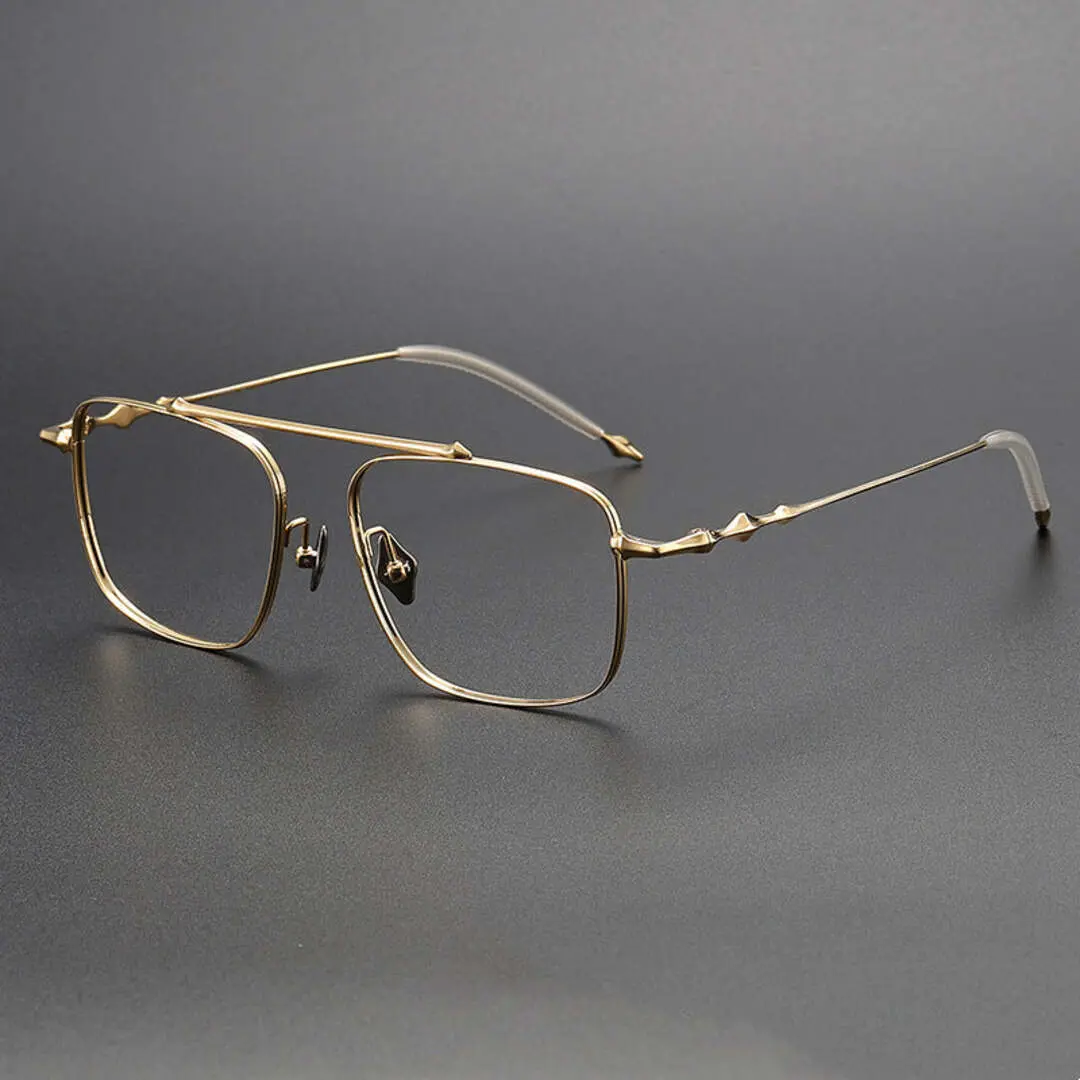 Angle view of Shawn aviator titanium eyeglasses AT0122412 in gold