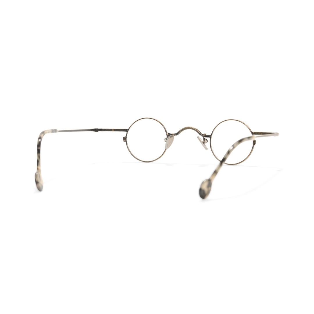 Back view of Xen round metal eyeglasses RM0242601 in bronze