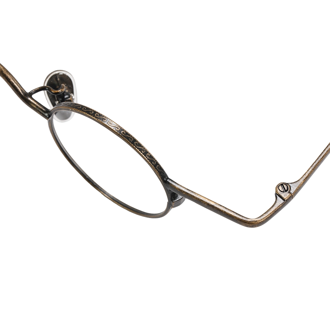 End piece detail of Xen round metal eyeglasses RM0242601 in bronze