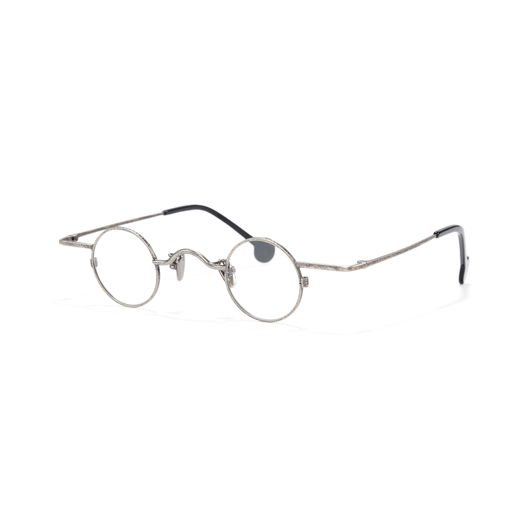 Angle view of Xen round metal eyeglasses RM0242601 in silver