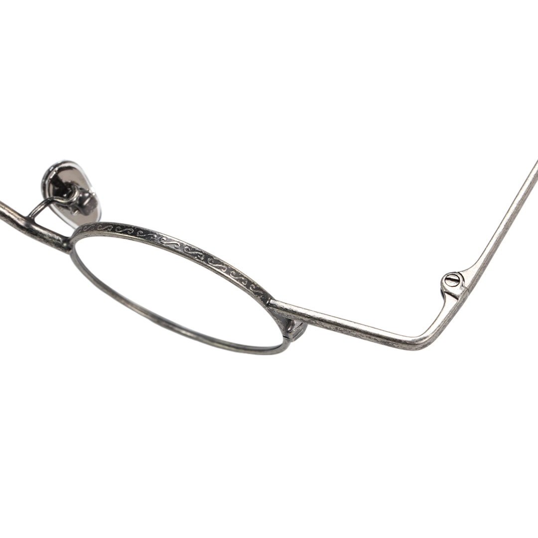 End piece detail of Xen round metal eyeglasses RM0242601 in silver